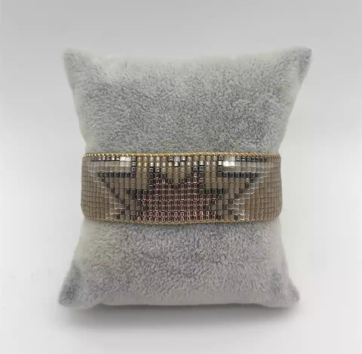 Perlearmbånd med gyllen stjerne