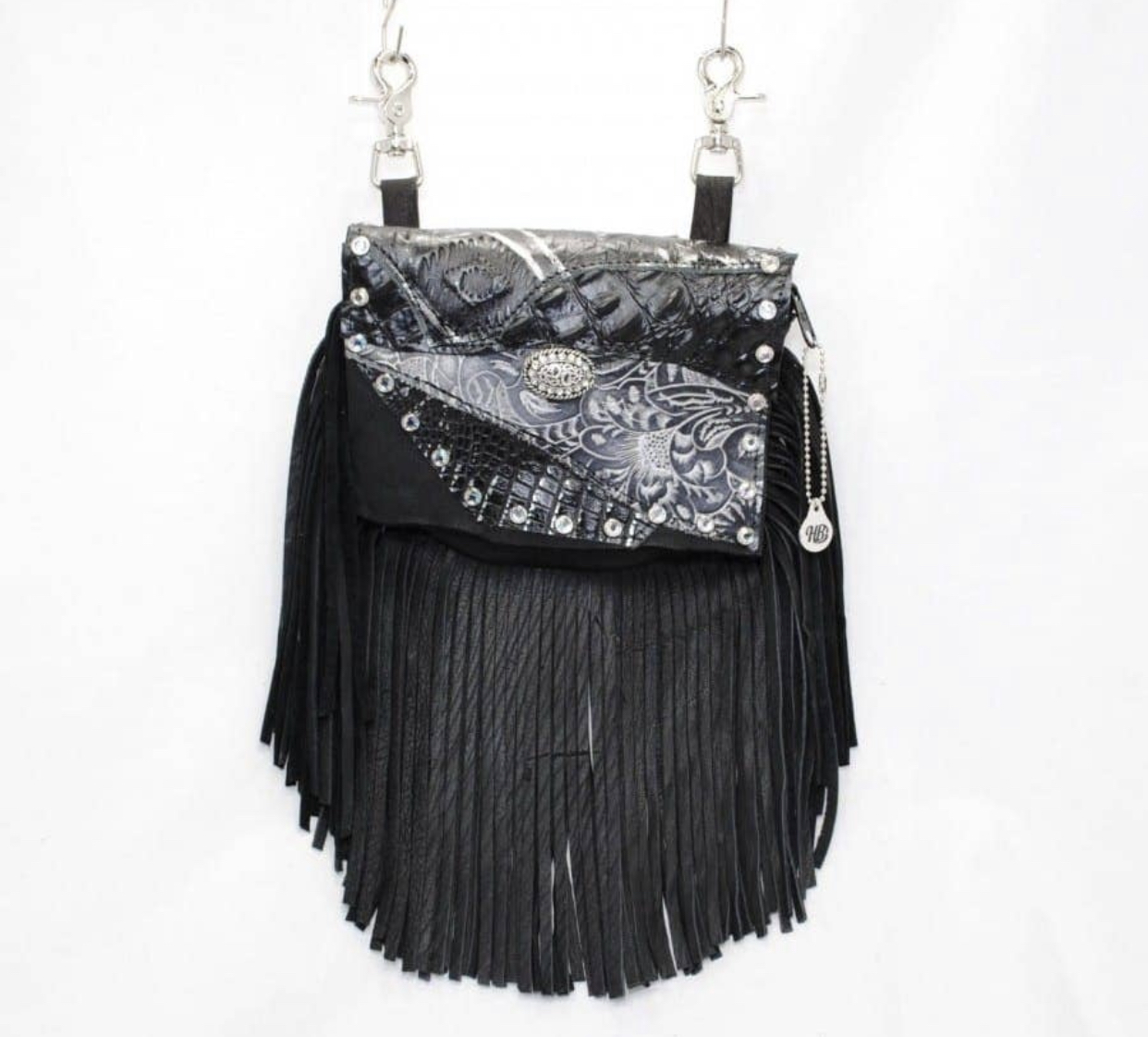 Hofteveske med svarte frynser og grå detaljer