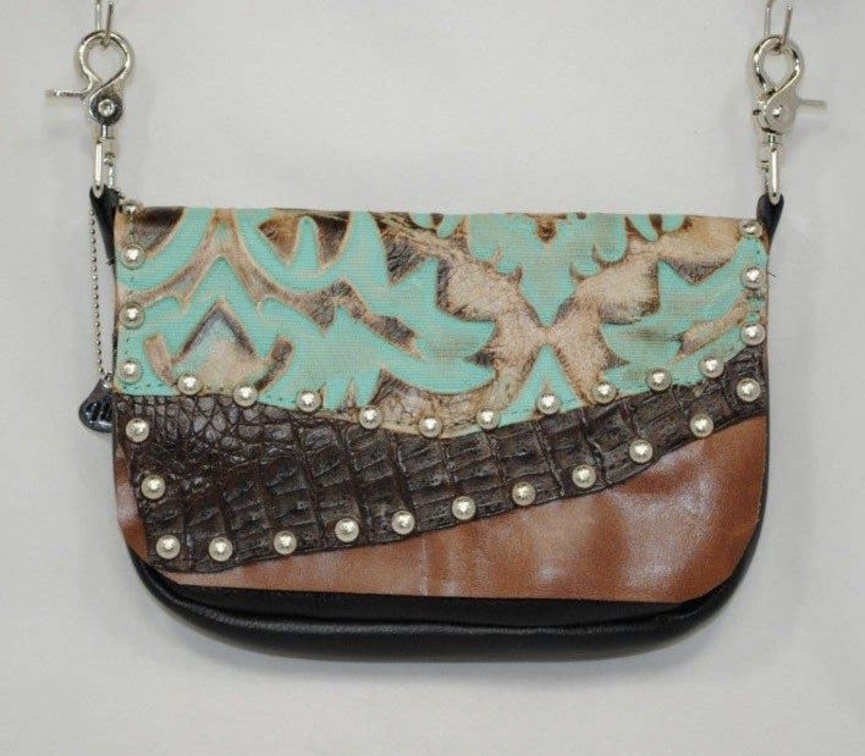 Hofteveske med sjøgrønt og brunt lokk