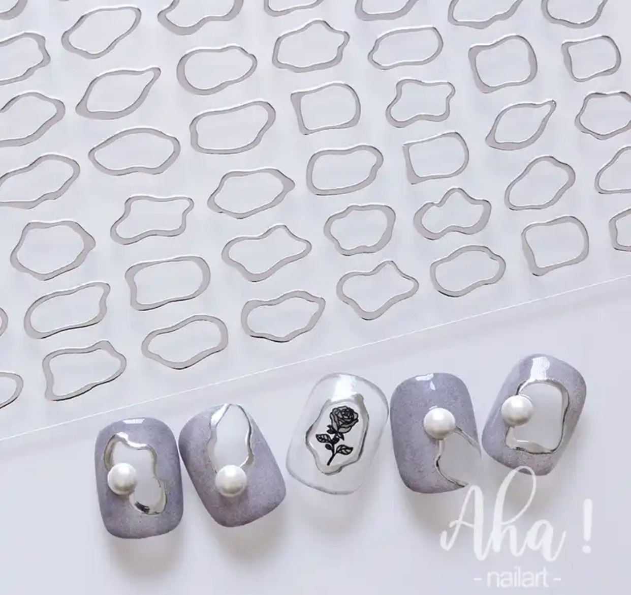 Neglestickers sølvramme