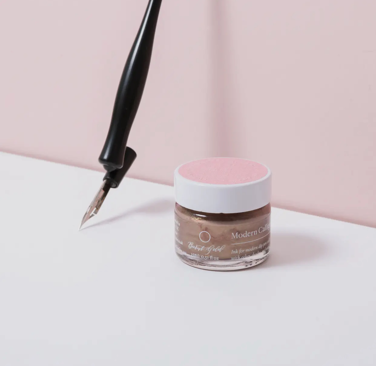 Kalligrafi blekk brent gull